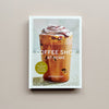 The book "Coffee Shop at Home" by Katerina Diaz with a covershowing a fancy coffee creation on a neutral background.