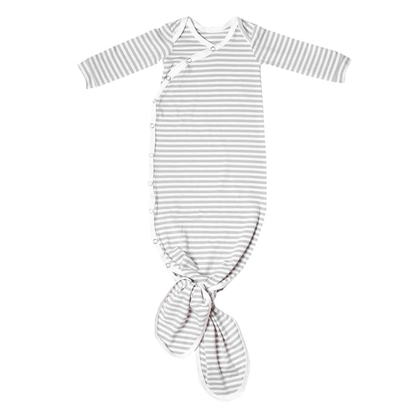 Grey and white striped baby gown with a knot at the bottom on a white background