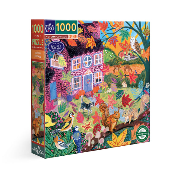 A 1000-piece jigsaw puzzle box by eeBoo featuring an autumn-themed illustration of a cottage surrounded by colorful fall foliage, squirrels, birds, and other wildlife.