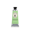 A tube of ElizabethW 'Muguet' 7% Shea Butter Hand Cream, featuring a light green label and a black cap, centered on a plain white background.