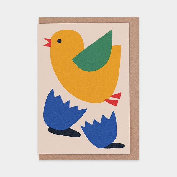 Card with a colorful chick flying out of a hatched egg design on a beige background