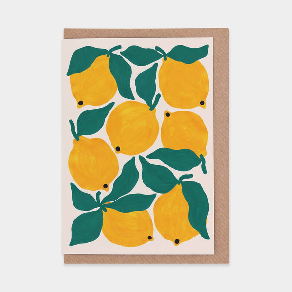 Greeting card with yellow lemons and green leaves on a white background