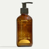 Brown bottle labeled 'Everyday Oil' and 'Mainstay' with pump on a white background