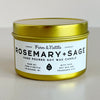Rosemary + Sage candle in a gold tin with a white label on a light background