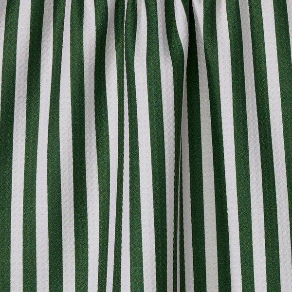 Close-up of green and white striped tea towel.