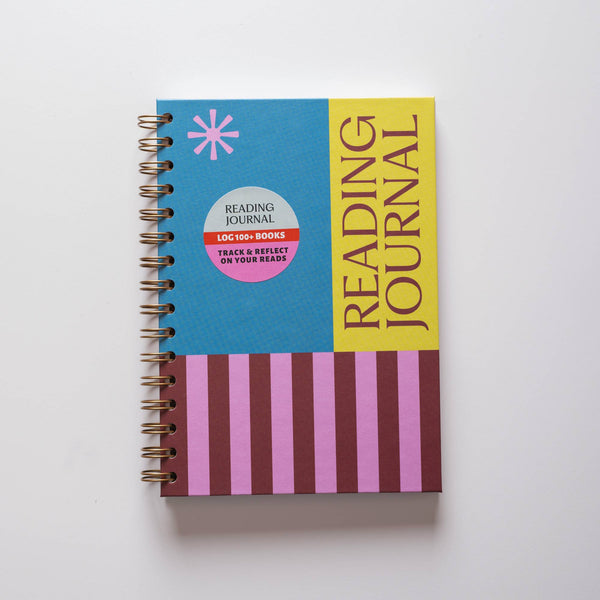 Reading journal with colorful cover on a white background