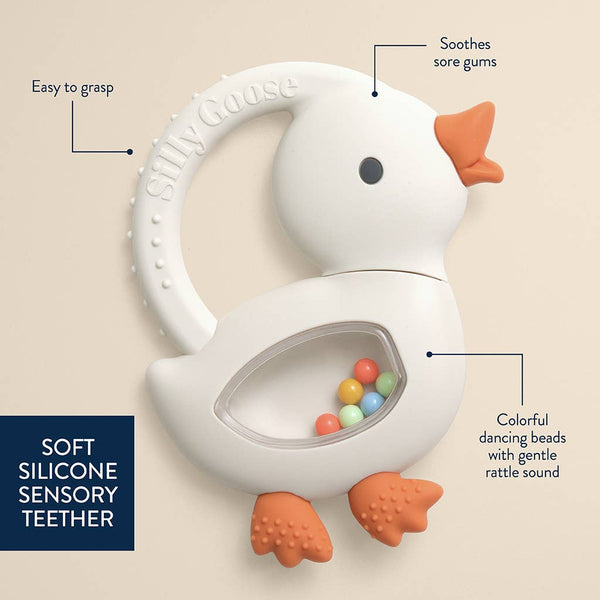 White goose silicone teething toy with features highlighted on a beige background.