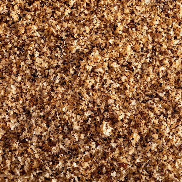 Close-up of a black garlic kosher sea salt blend.