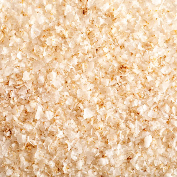 Close-up view of lemon zest-infused sea salt blend.