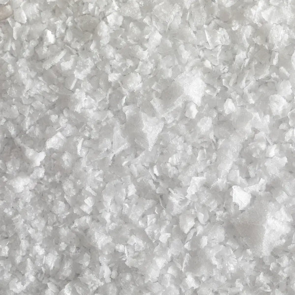 Close up view of pure flake sea salt.