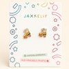 A pair of colorful roller skate stud earrings displayed on a white JAX KELLY brand card. The card features playful multicolor geometric line drawings and text indicating 'KID-FRIENDLY POSTS' and 'Hypoallergenic'.