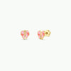 Pair of gold and pink enamel bow shaped earrings with kid-friendly flat back posts against a white background.