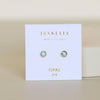 Opal earrings on a Jaxkelly branded card with a beige background