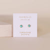 Turquoise earrings on a Jaxkelly branded card with a beige background