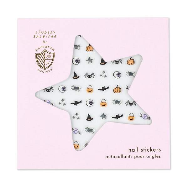 A pink cardstock envelope labeled 'Lindsey Balbierz for Daydream Society' and 'nail stickers' with a star-shaped window cutout showing a sheet of spooky Halloween themed nail stickers, including pumpkins, witch hats, spiders, and eyeballs.