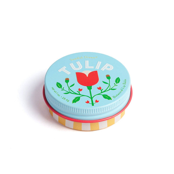 Tin of lip balm with a tulip design on the lid against a white background