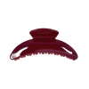 A glossy dark burgundy hair claw clip with the brand name 'KARST' embossed on the top, shown against a plain white background.