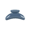 A glossy blue hair claw clip with the brand name 'KARST' embossed on the top, shown against a plain white background.