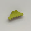 A pear green cloud-shaped hair claw clip with the brand name 'Kaxi' embossed on the top, shown against a plain light gray background.