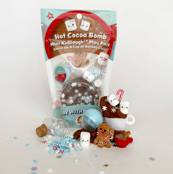 Hot Cocoa Bomb Mini KidDough Play Pack with toy figures on a white background