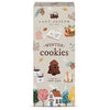 A tall rectangular box of Lady Joseph Winter Cookies, decorated with cozy autumn and winter illustrations including a gingerbread cookie, pinecones, a mug of tea, and small houses on a light beige background. There is an image of the chocolate cookie in a tree shape on the box.
