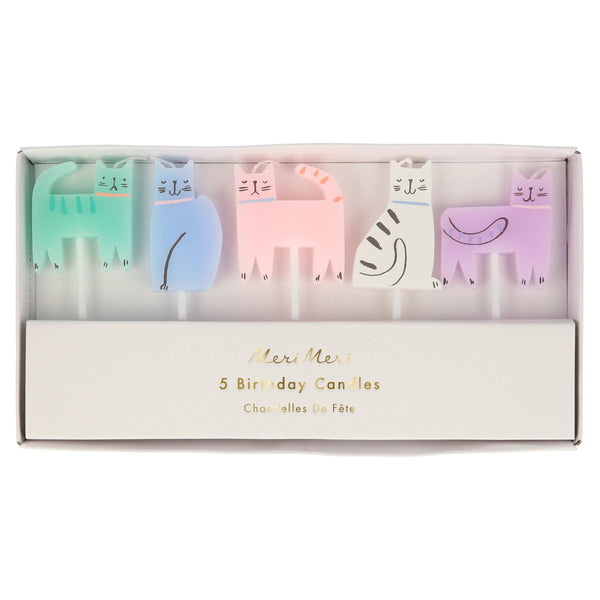 Set of five colorful cat-shaped birthday candles in a box with 'Meri Meri' branding.