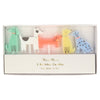 Set of five dog-shaped birthday candles in a box with 'Meri Meri' branding.
