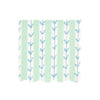 Wavy-edged paper napkin featuring a blue leaf pattern with green and white stripes on a white background