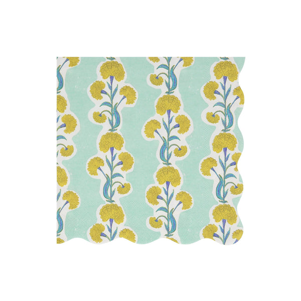 Wavy-edged paper napkin with yellow floral pattern on a light blue background