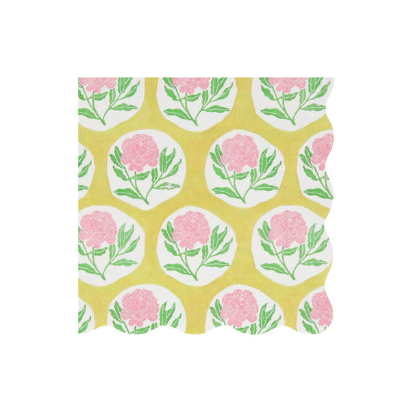 Patterned wavy-edged paper napkin with pink flowers and green leaves on a yellow background