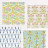 Four different floral patterned wavy-edge paper napkins arranged in a grid.