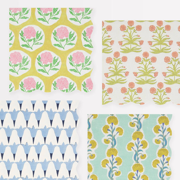 Four different floral patterned wavy-edge paper napkins arranged in a grid.