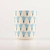 Melamine and cellulose reusable tumbler cup with blue and white geometric floral pattern on a light gray background