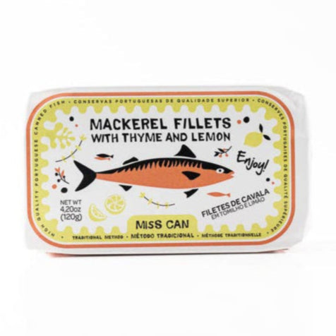 Can of mackerel fillets with thyme and lemon on a white background