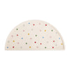 Half-circle silicone placemat with colorful smiley face pattern on a white background
