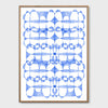 A wood-framed rectangular print of a blue and white abstract design against a white wall.