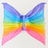 Rainbow-colored butterfly wing child's playtime costume on a plain background