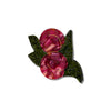 A hand-painted claw hair clip in the shape of two Japanese plums and leaves in rich iridescent red and green with gold accents, photographed on a white background.