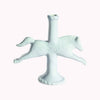 Light blue ceramic horse shaped taper candle holder against a white background.