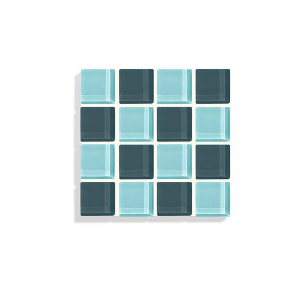 A dark teal and aqua blue mosaic tile coaster against a white background.