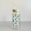 Glass travel cup featuring a colorful tulip print. The cup comes with a bamboo lid and glass straw. 