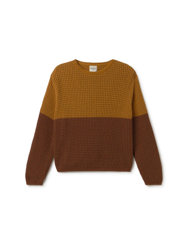 Two-tone yellow-brown and warm brown sweater on a white background