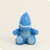 Blue plush T-Rex toy with a smiling face on a light beige background