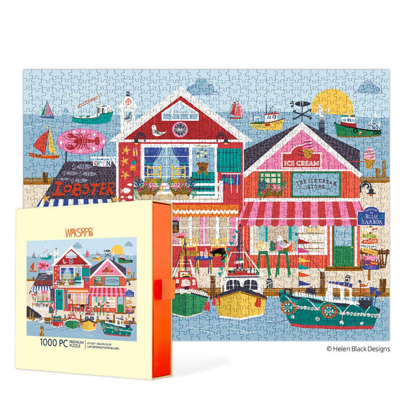 Jigsaw puzzle box with a colorful coastal scene design on a white background