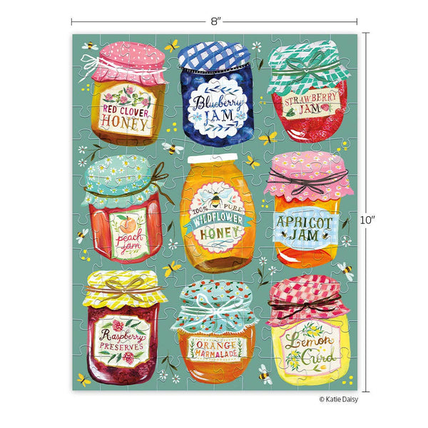 Colorful jam and honey jar puzzle with labels on a green background. This image shows the 8" by 10" dimensions. 