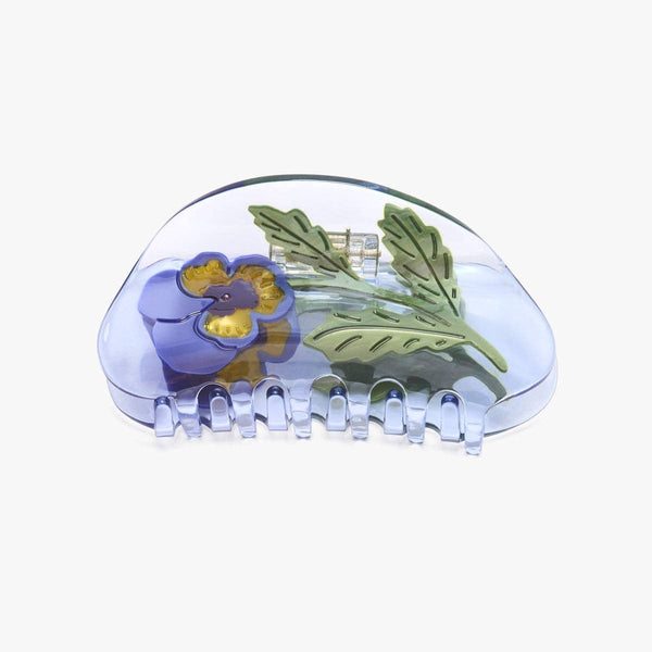 Clear hair clip with purple flower and green leaves design on a white background
